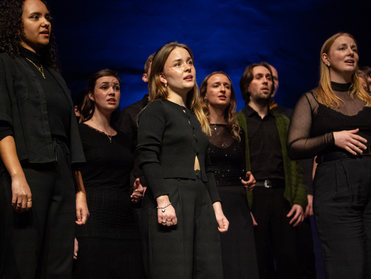 N M U B